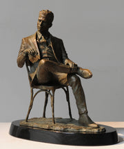 Man Sitting in Chair