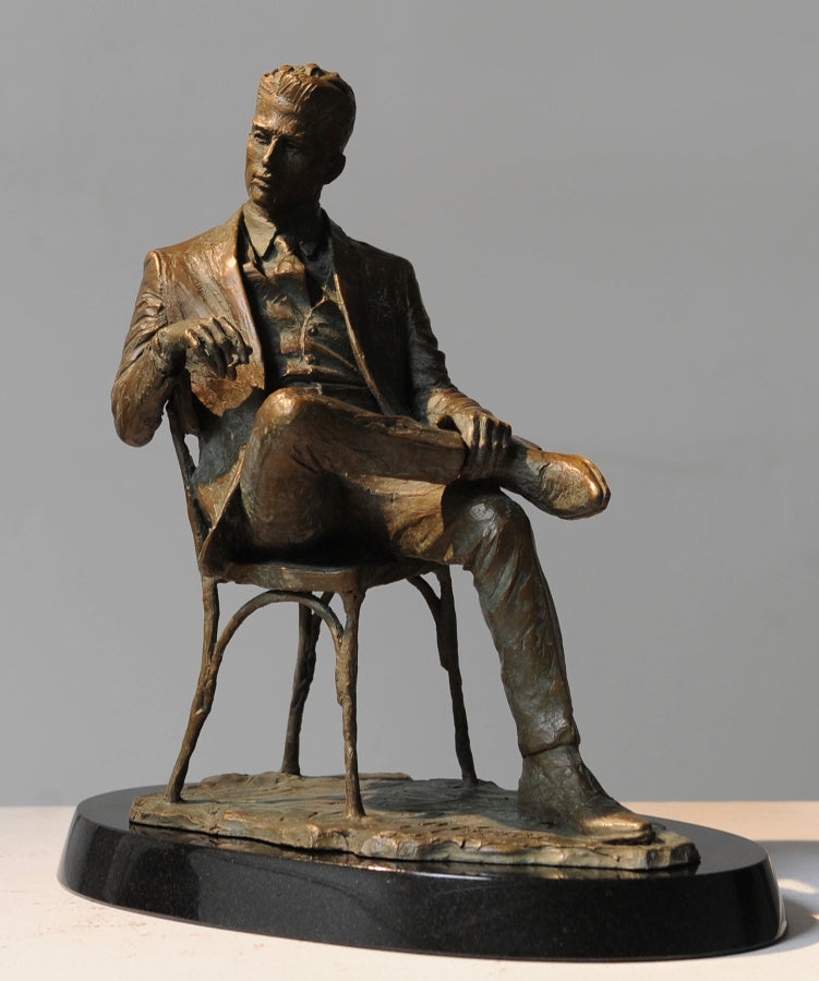 Man Sitting in Chair