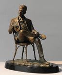 Man Sitting in Chair